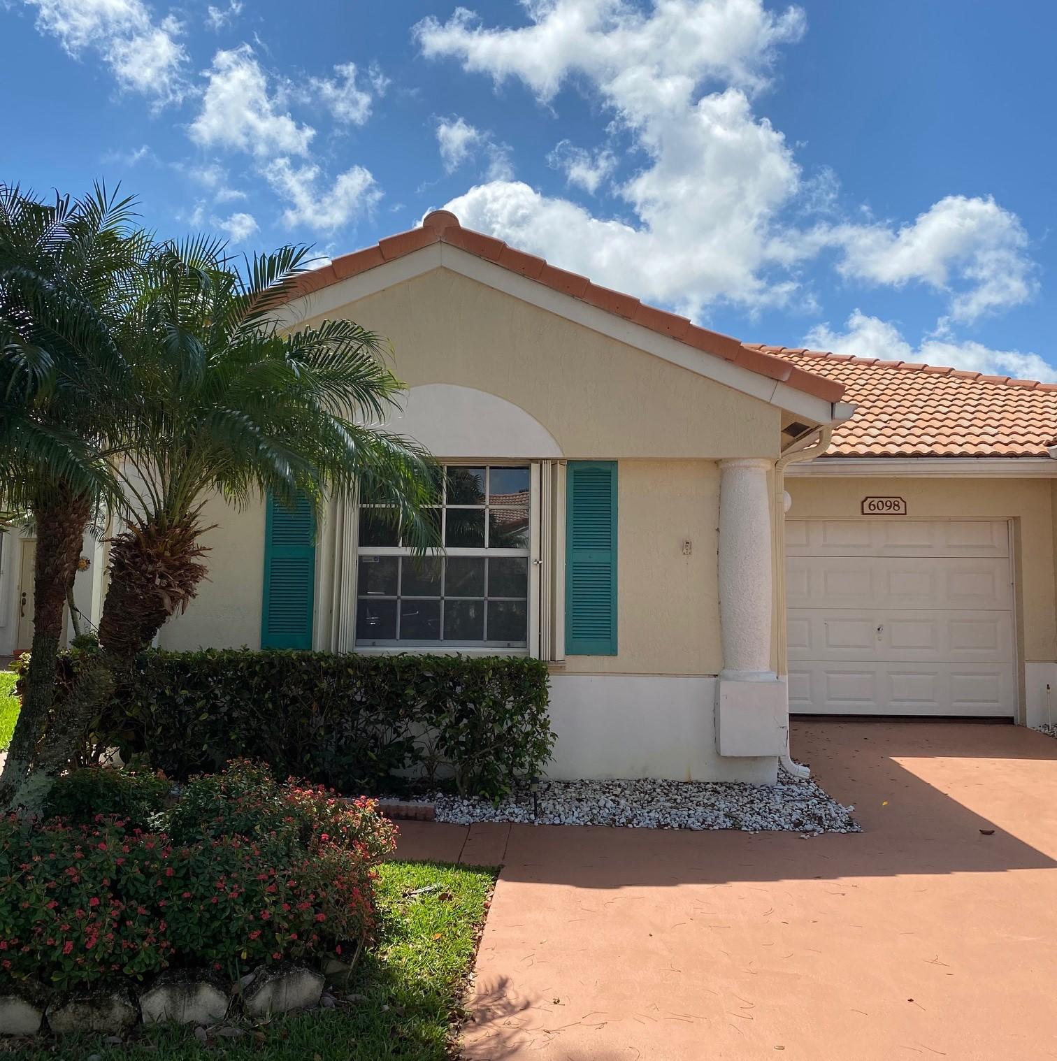 6098 Heliconia Road Delray Beach, FL 33484 - Photo 1 of 15 Front View