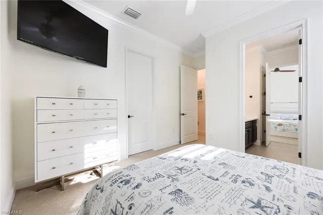 a bathroom with a sink double vanity and a mirror
