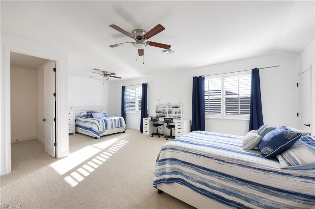 3275 Pilot Circle Naples, FL 34120 - Photo 28 of 44 a bedroom with furniture and a large window