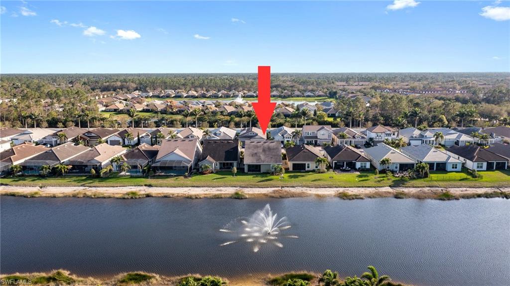 3275 Pilot Circle Naples, FL 34120 - Photo 36 of 44 a view of a city with an ocean beach