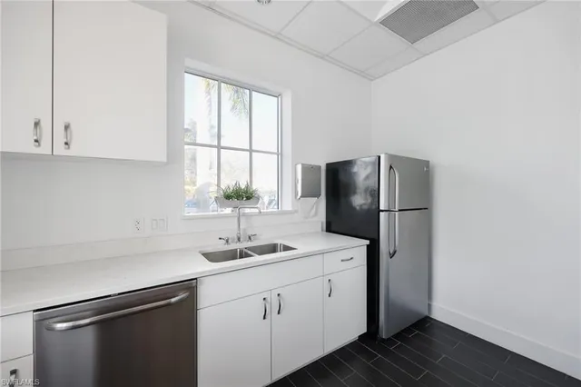 a view of a swimming pool with a lake view and mountain view