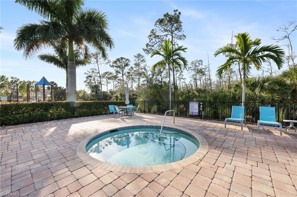 3275 Pilot Circle Naples, FL 34120 - Photo 43 of 44 a view of a swimming pool with a patio