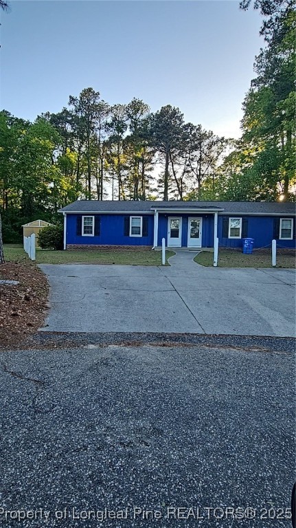 1432 A Mathau Court Fayetteville, NC 28304 - Photo 2 of 13 a view of a house with a yard