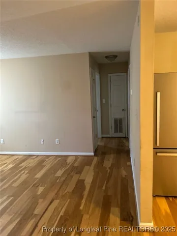 a view of a room with a door