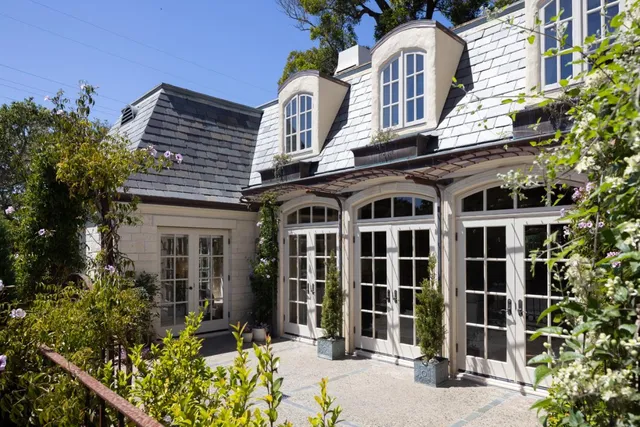 a living room with furniture and window