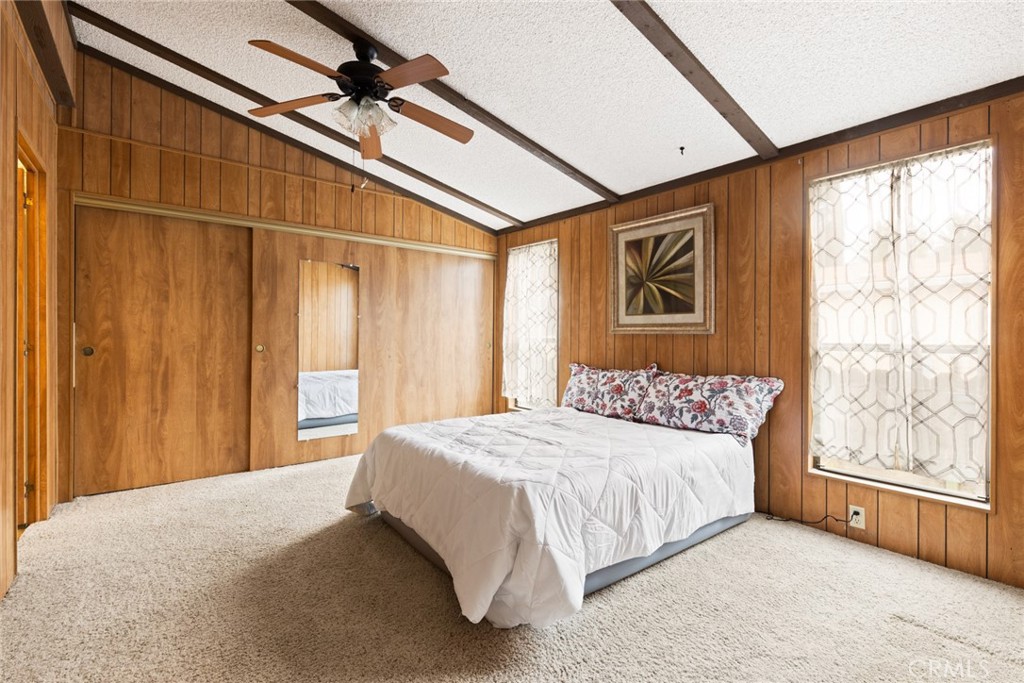 3835 Gardiner Ferry Road, Unit 4 Corning, CA 96021 - Photo 13 of 22 a bedroom with a bed and a window