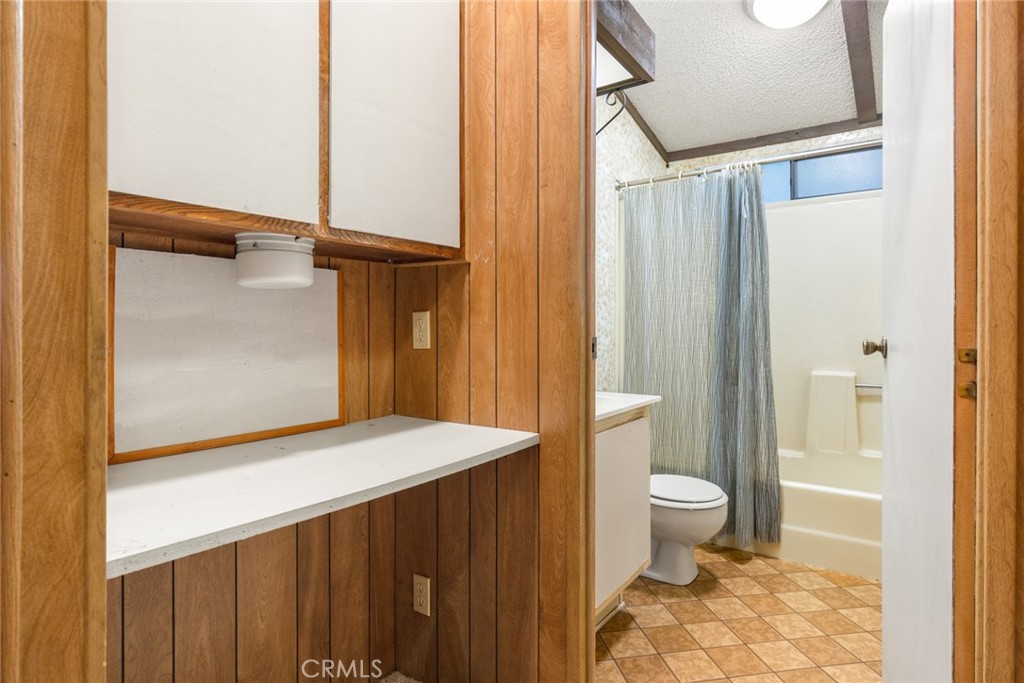 3835 Gardiner Ferry Road, Unit 4 Corning, CA 96021 - Photo 16 of 22 a bathroom with a sink a toilet and shower