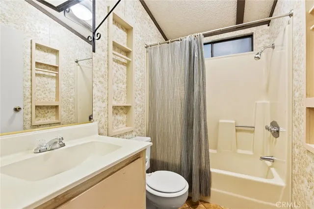 a bathroom with a sink and a shower
