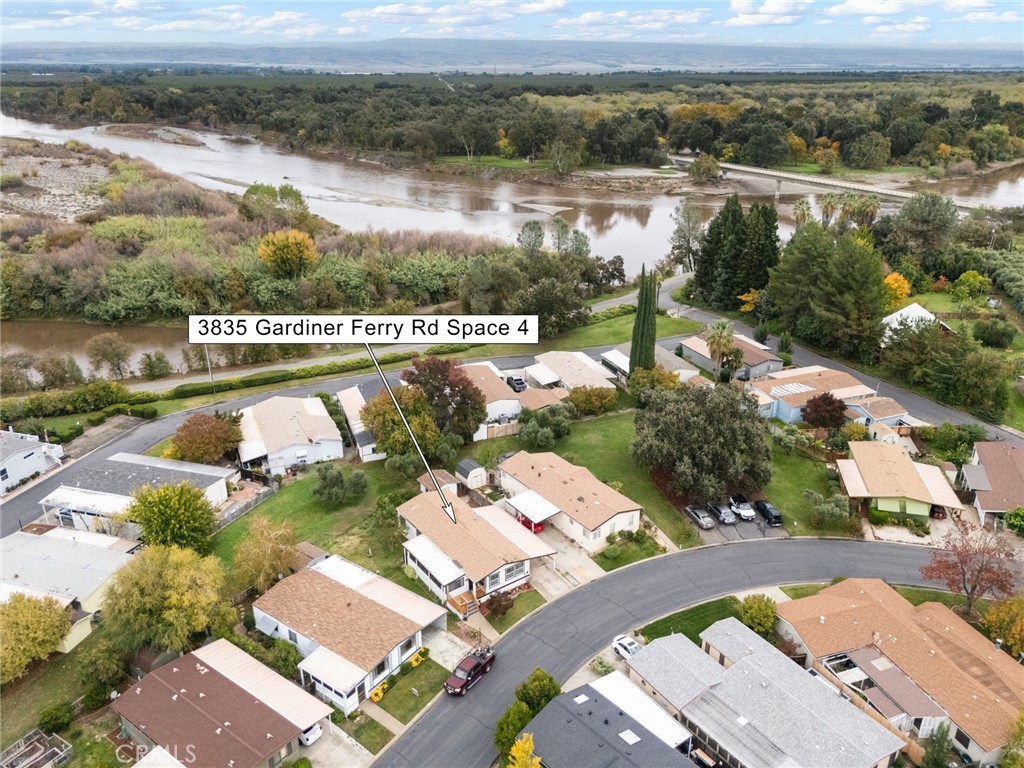 3835 Gardiner Ferry Road, Unit 4 Corning, CA 96021 - Photo 2 of 22 an aerial view of a house with a lake view