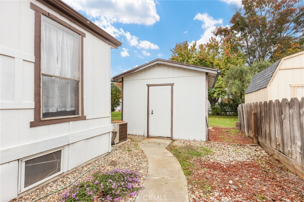 3835 Gardiner Ferry Road, Unit 4 Corning, CA 96021 - Photo 21 of 22 a front view of a house with a yard