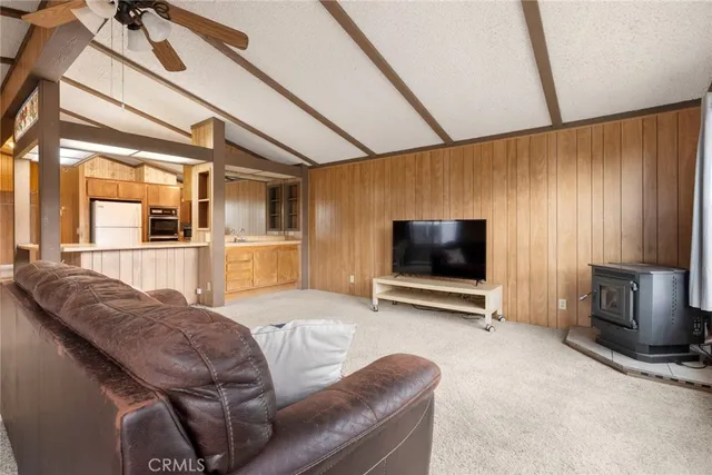 a living room with a couch and a flat screen tv