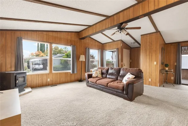 a living room with furniture and a bathtub