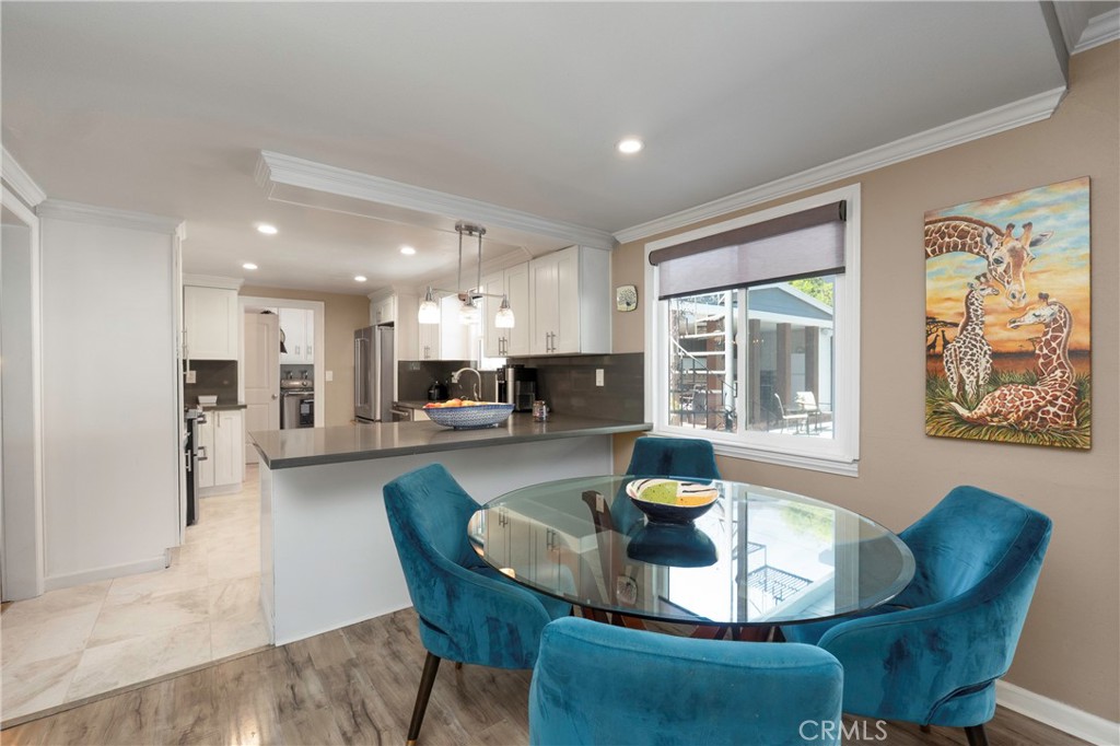 5481 Peacock Lane Riverside, CA 92505 - Photo 15 of 69 a dining room with furniture and large windows