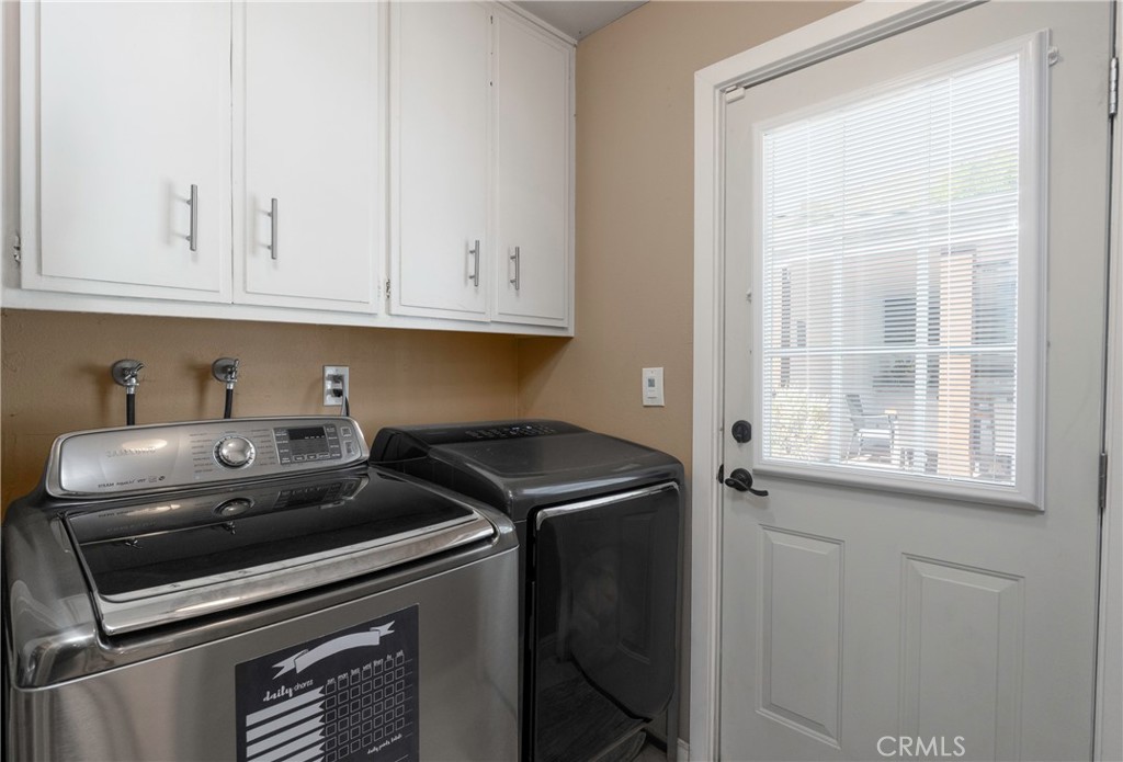 5481 Peacock Lane Riverside, CA 92505 - Photo 19 of 69 a kitchen with a sink and cabinets