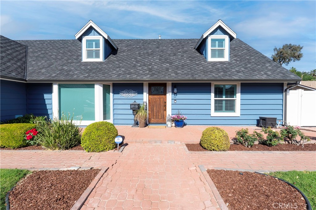 5481 Peacock Lane Riverside, CA 92505 - Photo 2 of 69 a front view of a house with a yard and potted plants
