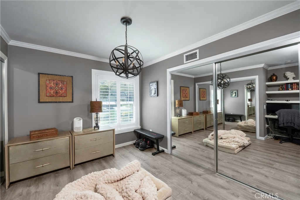 5481 Peacock Lane Riverside, CA 92505 - Photo 25 of 69 a living room with furniture and a chandelier
