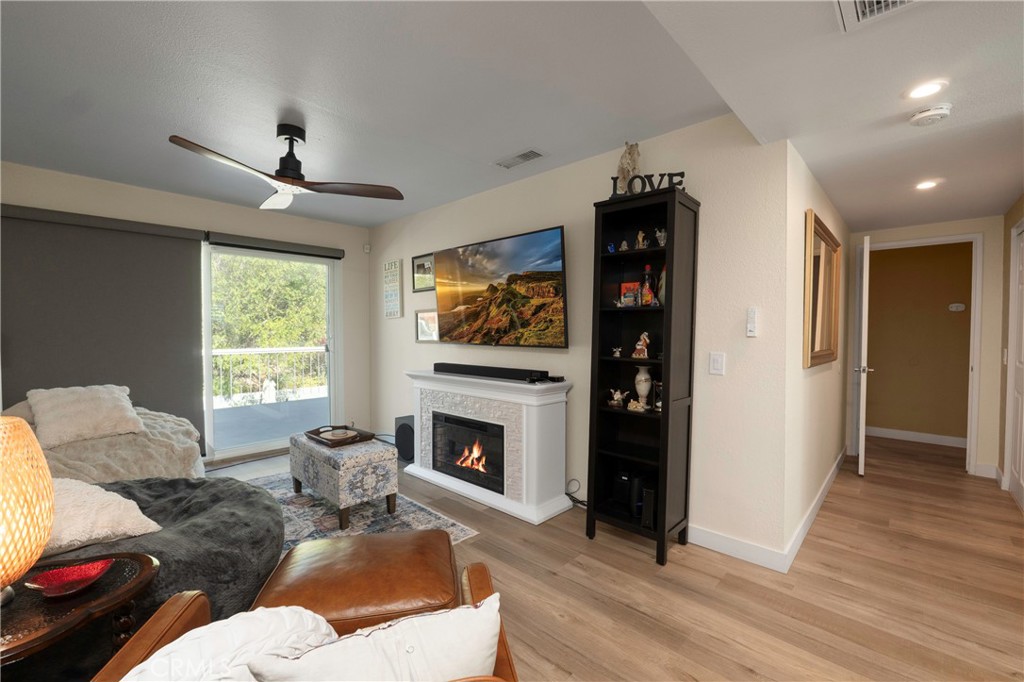 5481 Peacock Lane Riverside, CA 92505 - Photo 41 of 69 a living room with furniture fireplace and window