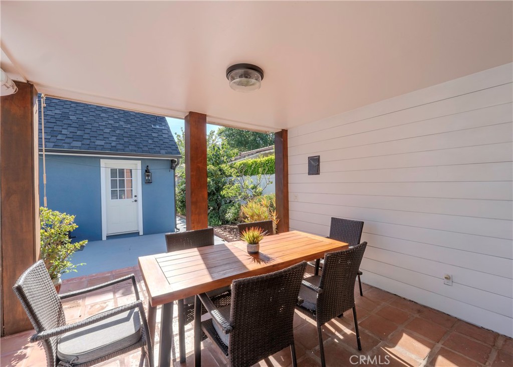 5481 Peacock Lane Riverside, CA 92505 - Photo 50 of 69 a view of a dining room with furniture window and wooden floor