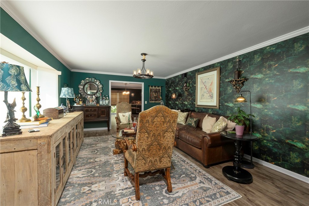 5481 Peacock Lane Riverside, CA 92505 - Photo 6 of 69 a living room with furniture a fireplace and a table