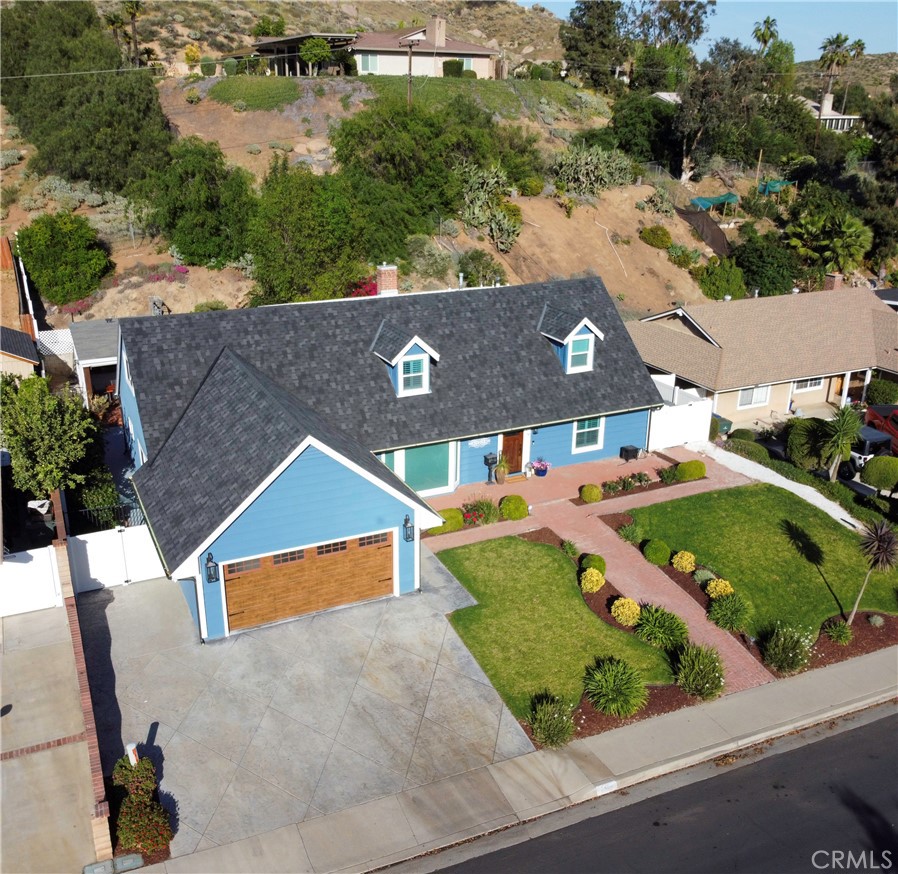 5481 Peacock Lane Riverside, CA 92505 - Photo 63 of 69 an aerial view of a house with a yard and lake view