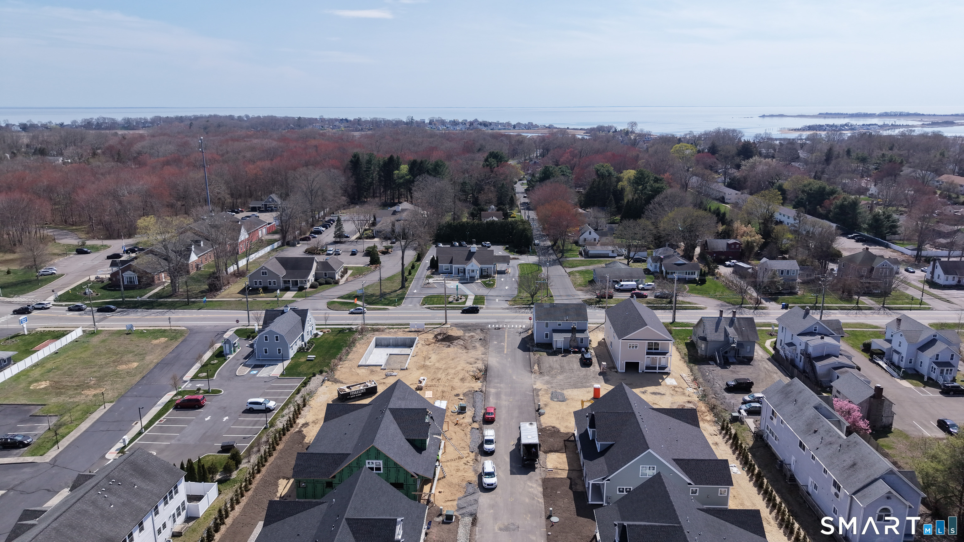 151-153 East Main Street, Unit 16 Clinton, CT 06413 - Photo 17 of 32 an aerial view of a city with lots of residential buildings