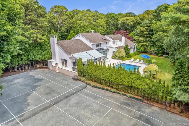 an aerial view of a house with a garden