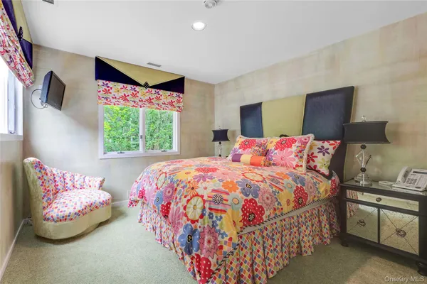 an aerial view of a house having patio with swimming pool