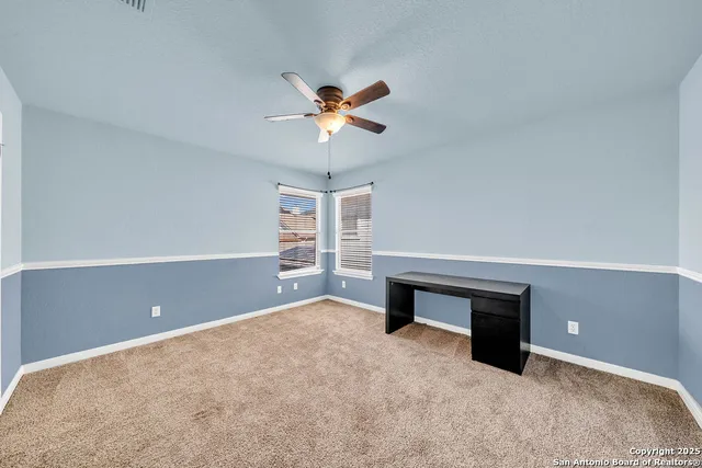 a bathroom with a sink a tub and a mirror