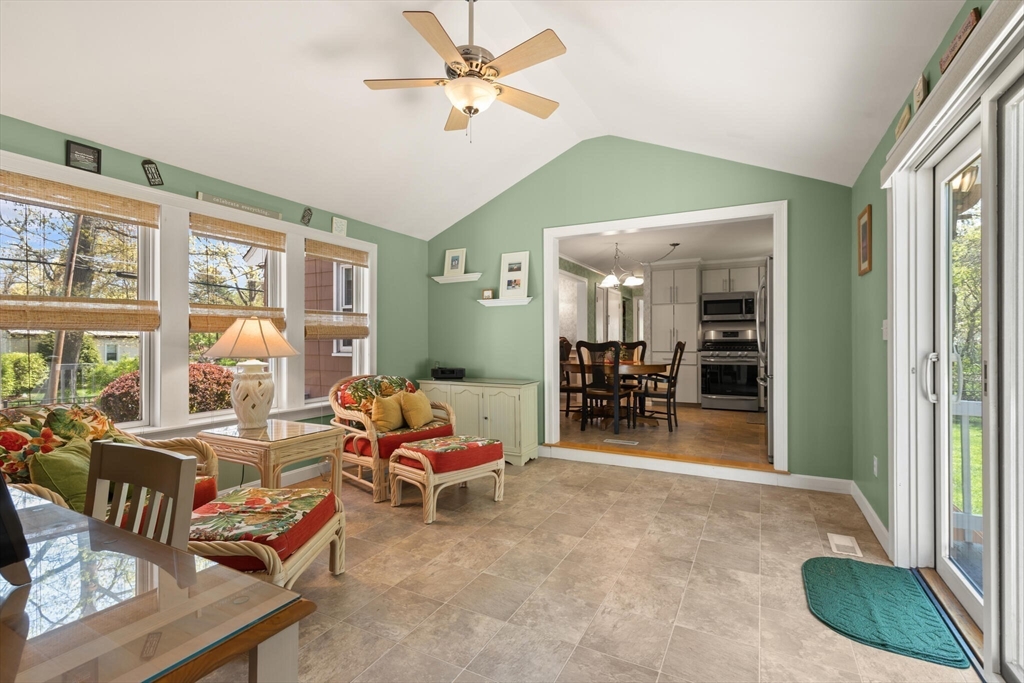 25 Bellflower Road Billerica, MA 01821 - Photo 20 of 40 a living room filled with furniture and a chandelier