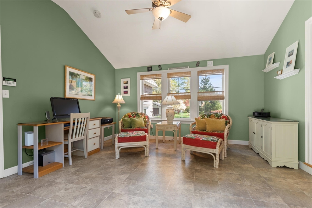 25 Bellflower Road Billerica, MA 01821 - Photo 21 of 40 a living room with furniture and a window