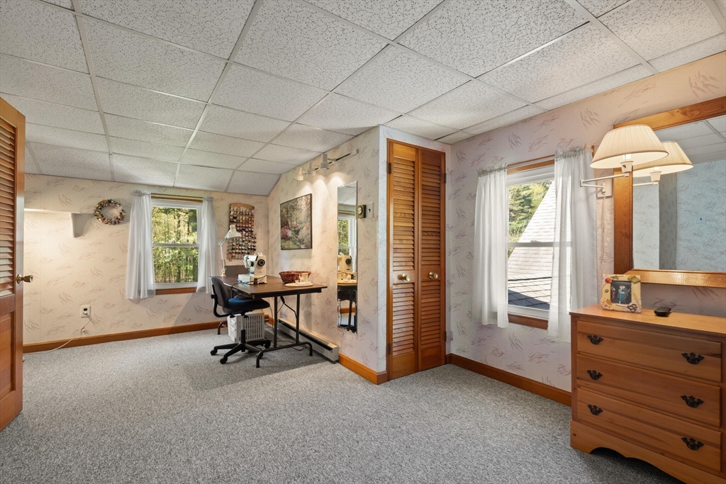 25 Bellflower Road Billerica, MA 01821 - Photo 28 of 40 a view of a livingroom with furniture and windows
