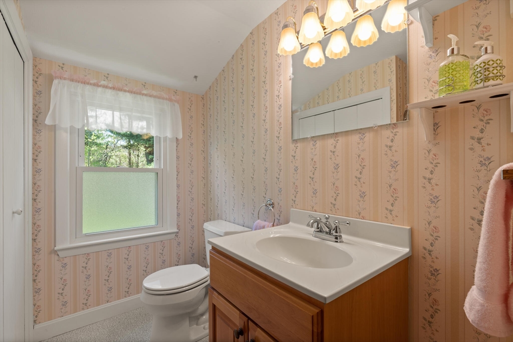 25 Bellflower Road Billerica, MA 01821 - Photo 29 of 40 a bathroom with a sink and a toilet