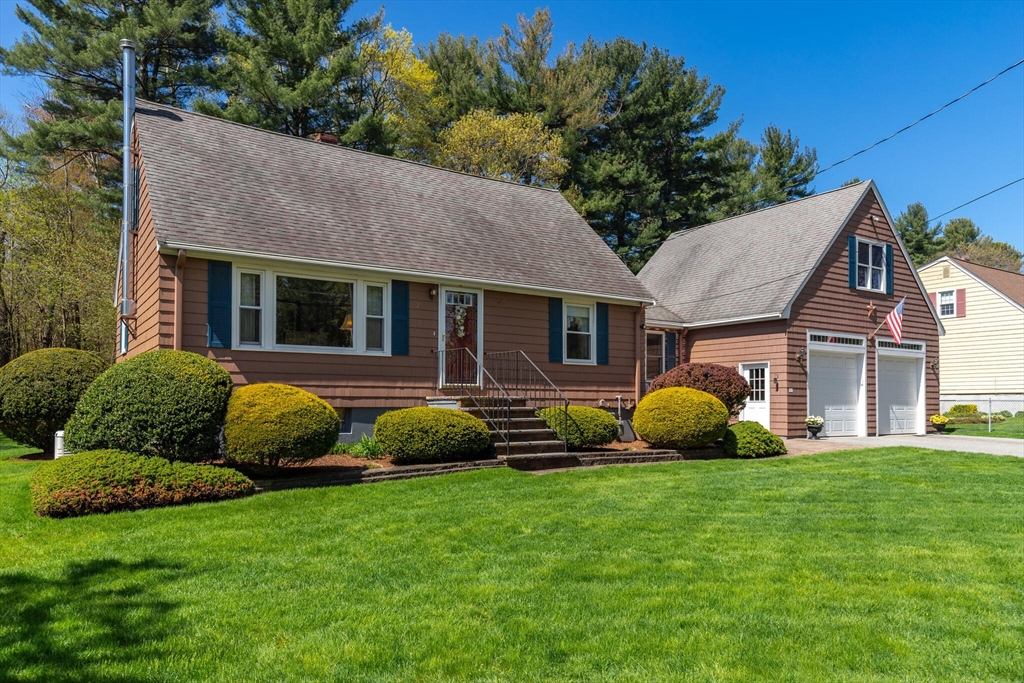 25 Bellflower Road Billerica, MA 01821 - Photo 3 of 40 a view of a house with a backyard and porch