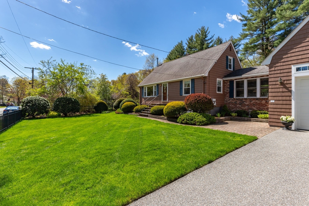25 Bellflower Road Billerica, MA 01821 - Photo 4 of 40 a front view of house with yard and green space