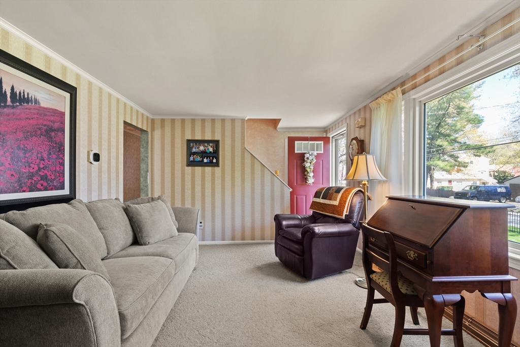 25 Bellflower Road Billerica, MA 01821 - Photo 9 of 40 a living room with furniture and a window