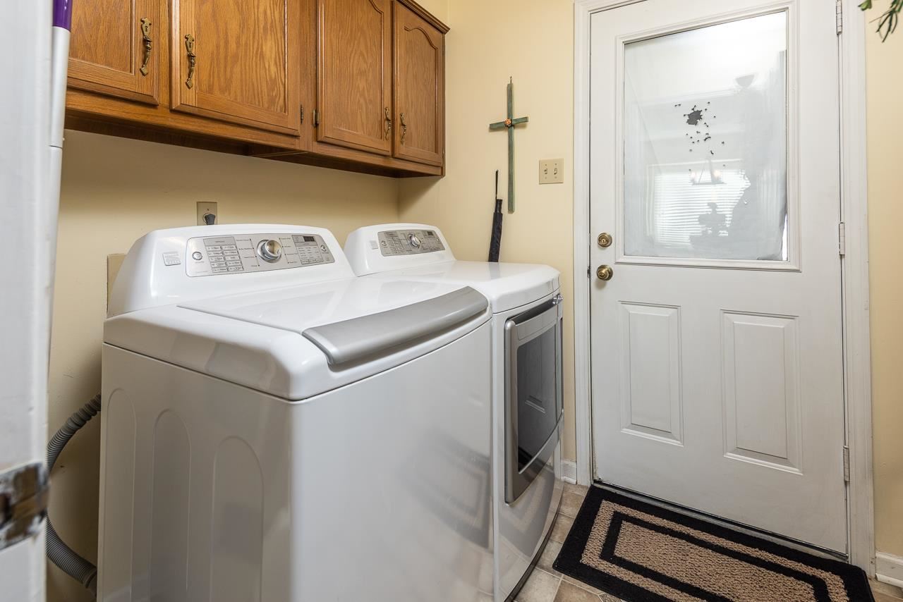297 East White Road Collierville, TN 38017 - Photo 11 of 20 a utility room with dryer and washer