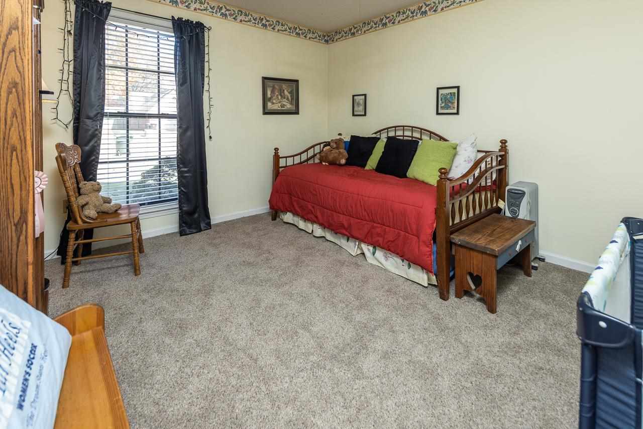297 East White Road Collierville, TN 38017 - Photo 12 of 20 a living room with furniture and a window