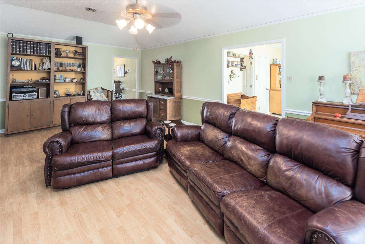 297 East White Road Collierville, TN 38017 - Photo 5 of 20 a living room with furniture and a large window