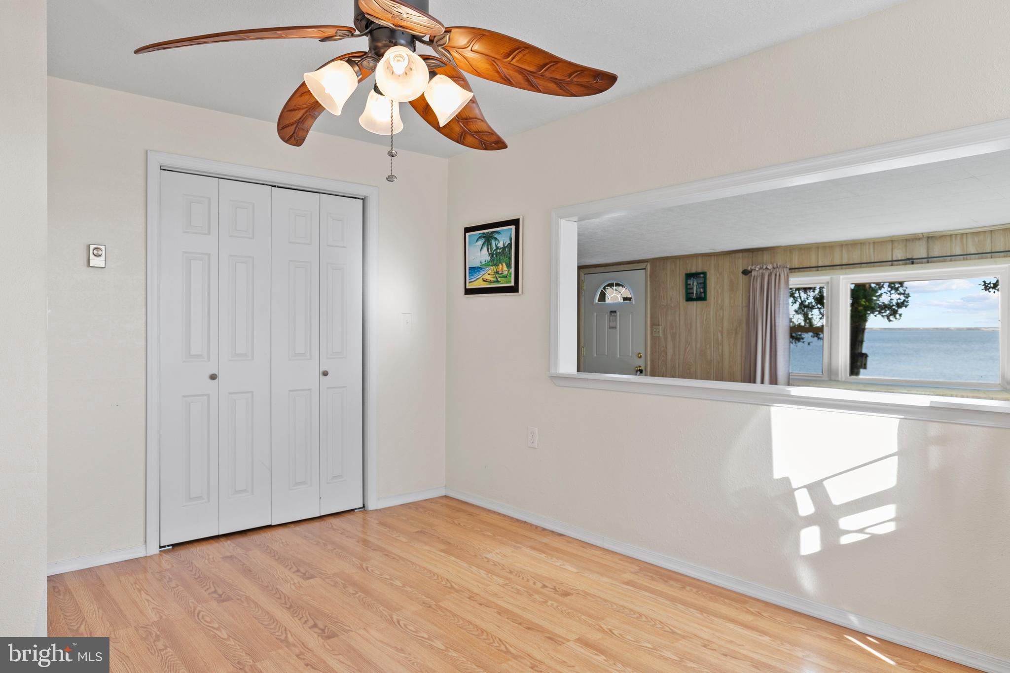 8569 Bay Road Pasadena, MD 21122 - Photo 14 of 41 Ceiling fan in dining room for balmy dinners