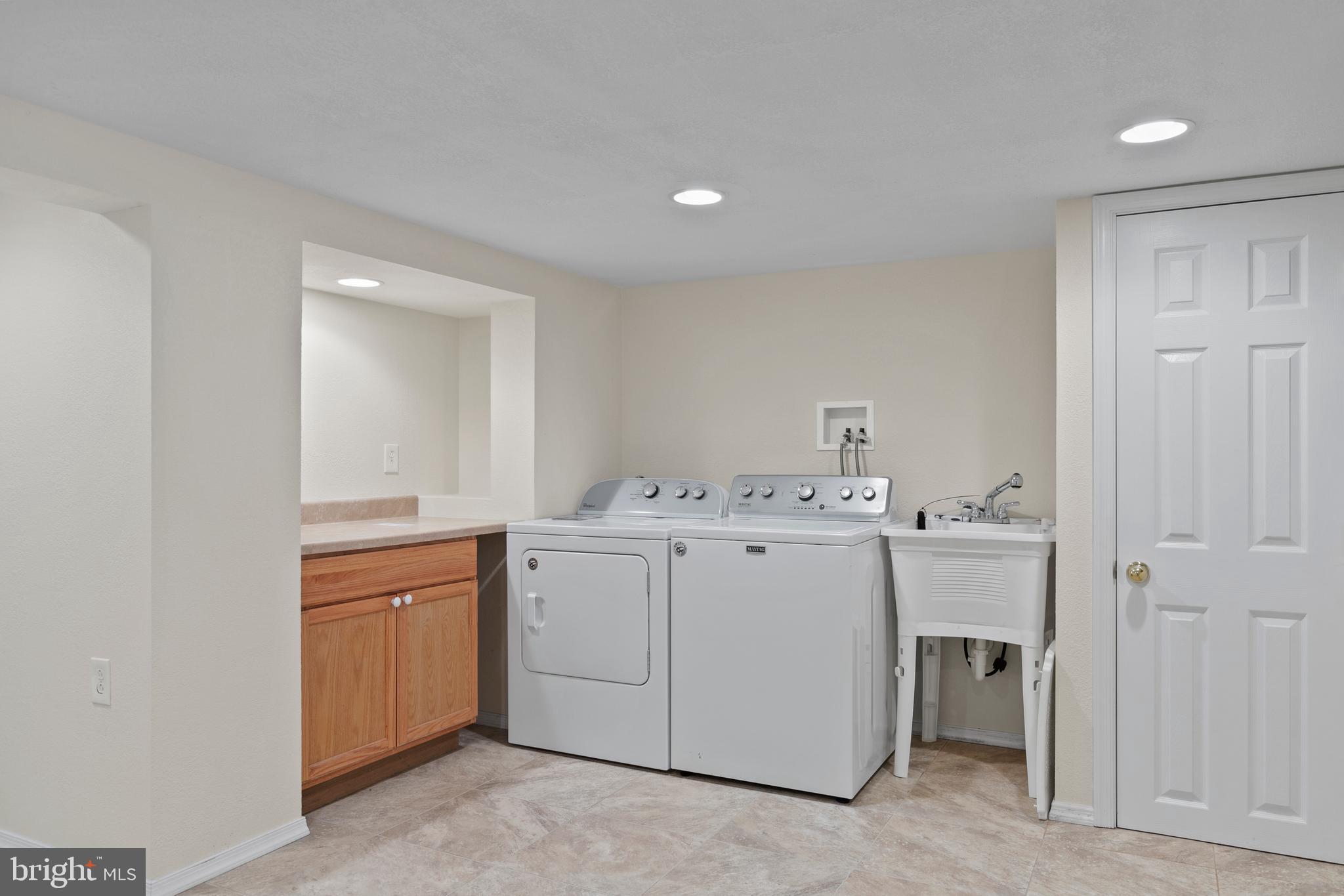 8569 Bay Road Pasadena, MD 21122 - Photo 16 of 41 Updated laundry and craft room.
