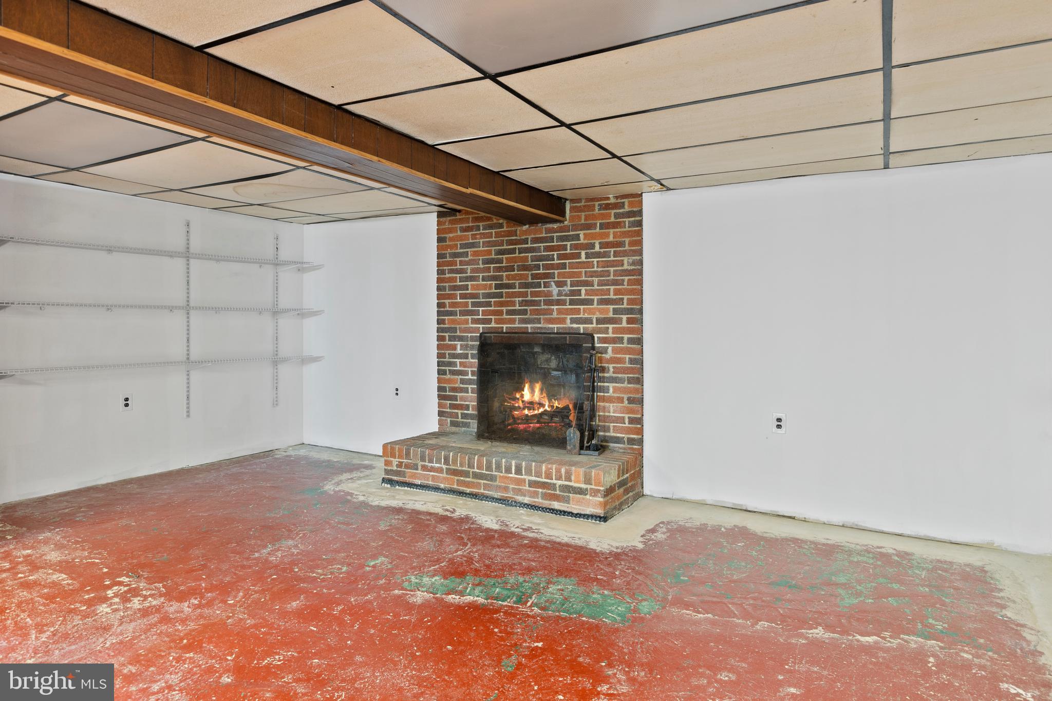 8569 Bay Road Pasadena, MD 21122 - Photo 21 of 41 Basement with WB/FP awaits your finishing touch