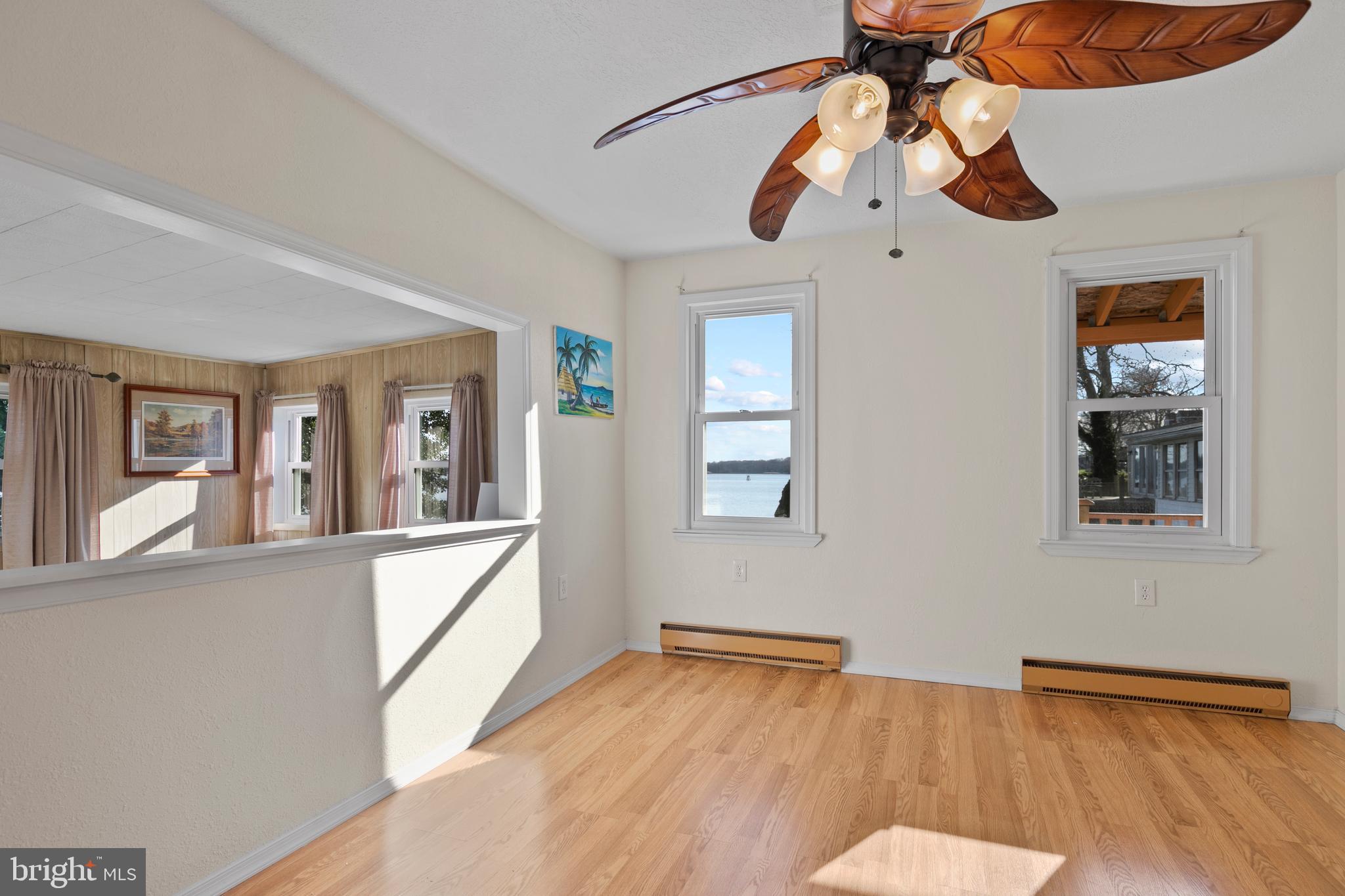 8569 Bay Road Pasadena, MD 21122 - Photo 28 of 41 Dining room sharing the view with the living rm.