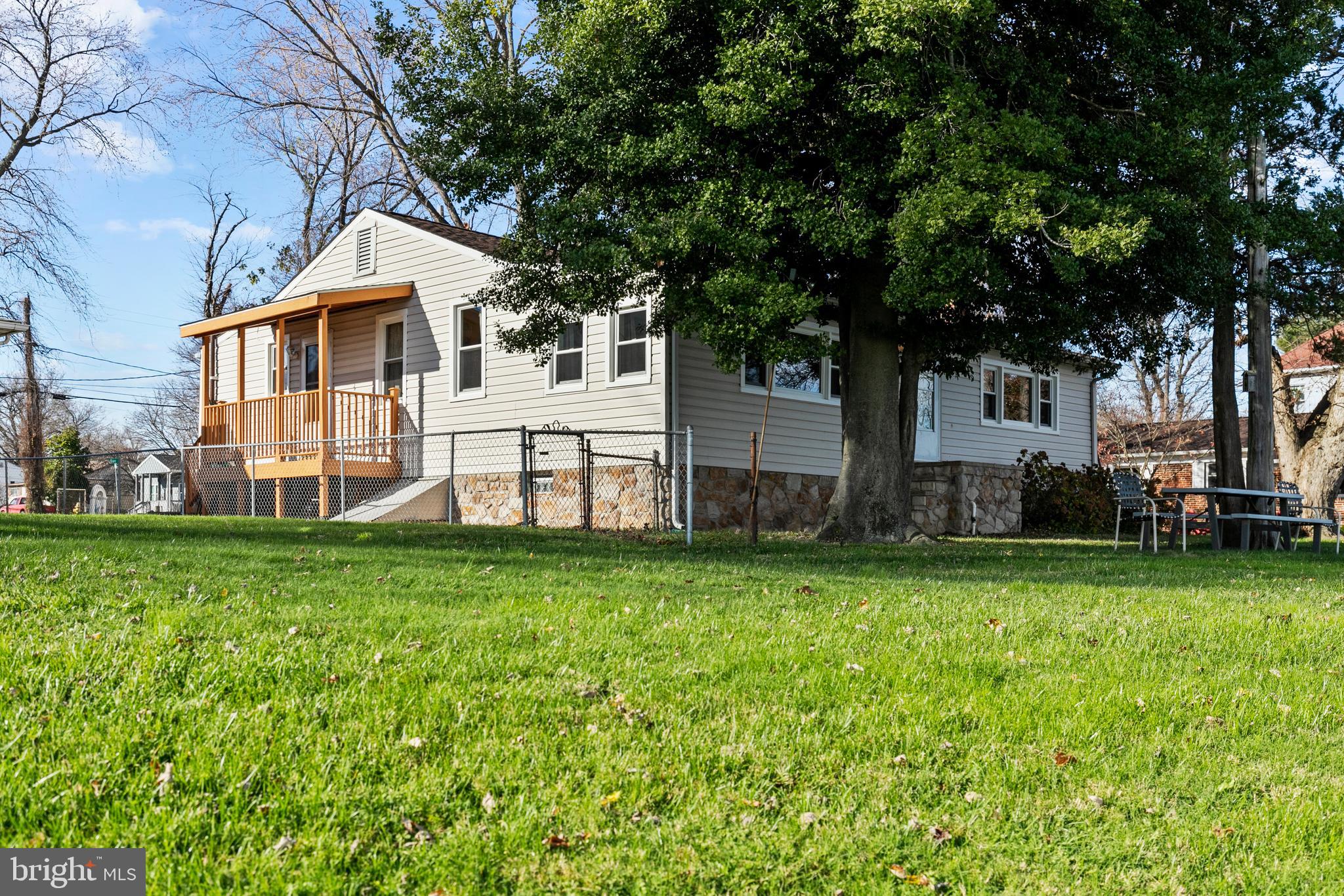 8569 Bay Road Pasadena, MD 21122 - Photo 29 of 41 Side and waterside perspective.