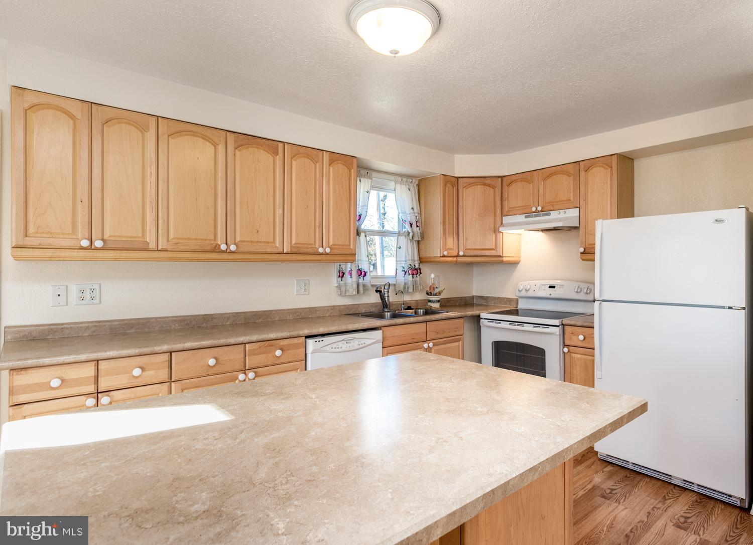 8569 Bay Road Pasadena, MD 21122 - Photo 9 of 41 Updated kitchen with island ready for your baking