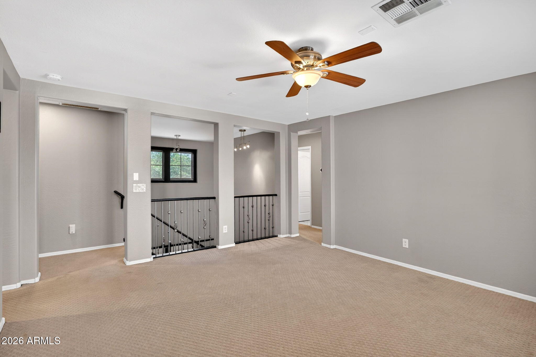 1729 South Reseda Street Gilbert, AZ 85295 - Photo 23 of 52 a view of a livingroom with a ceiling fan and window