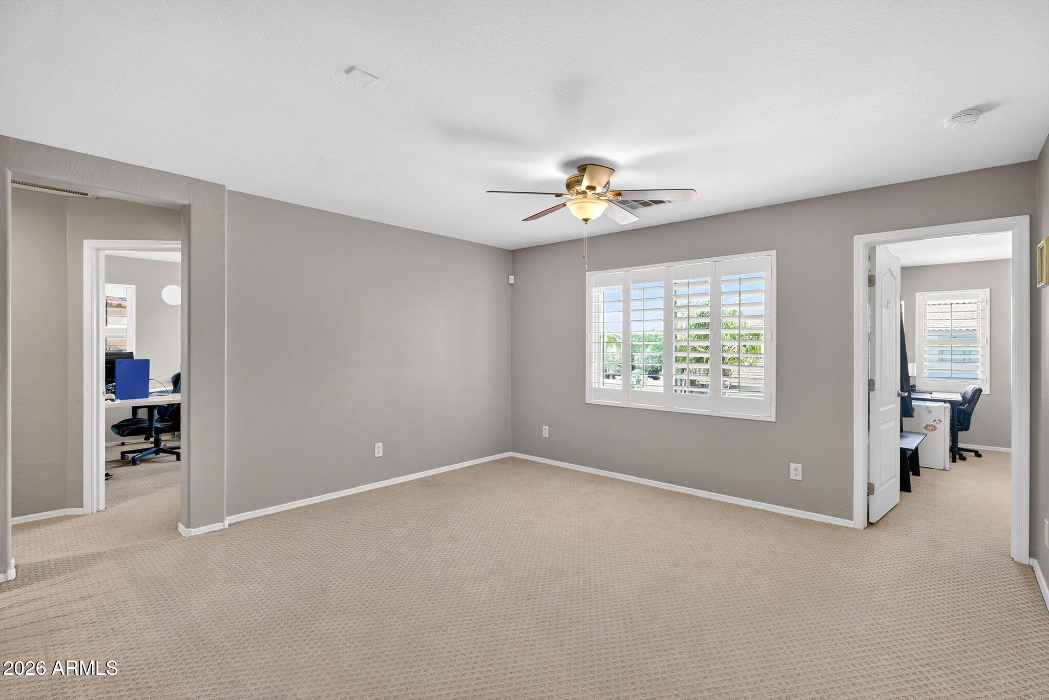 1729 South Reseda Street Gilbert, AZ 85295 - Photo 24 of 52 a view of an empty room with a window