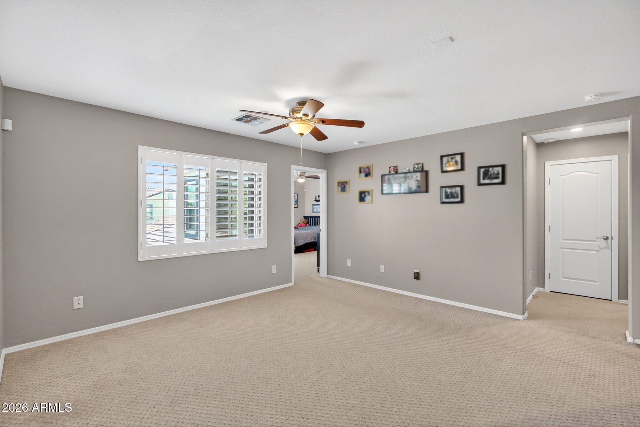 1729 South Reseda Street Gilbert, AZ 85295 - Photo 25 of 52 a view of an empty room with a window