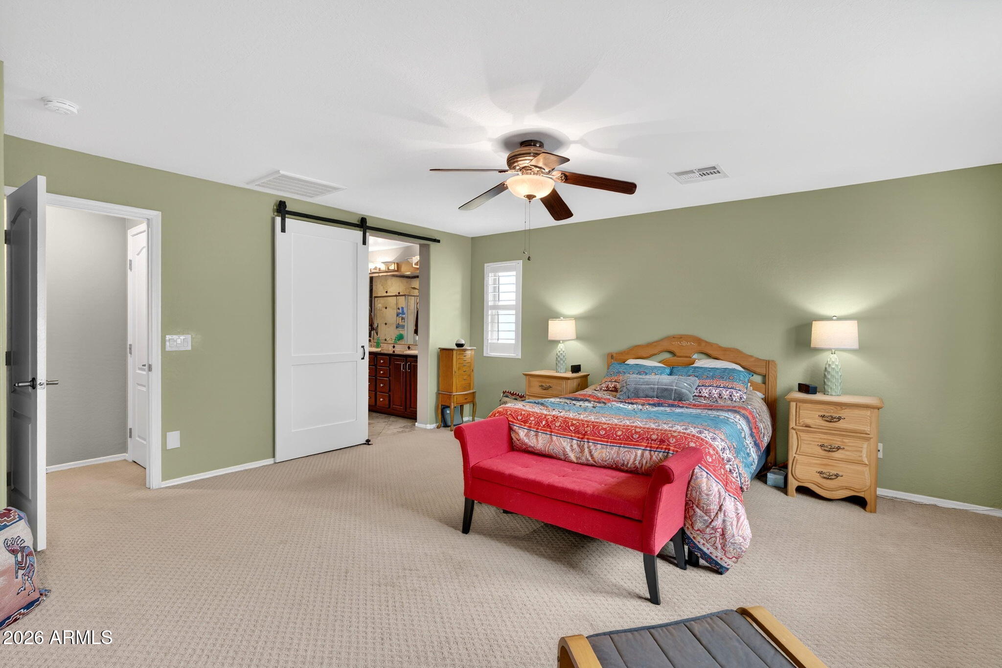 1729 South Reseda Street Gilbert, AZ 85295 - Photo 27 of 52 a bedroom with a bed and a chandelier