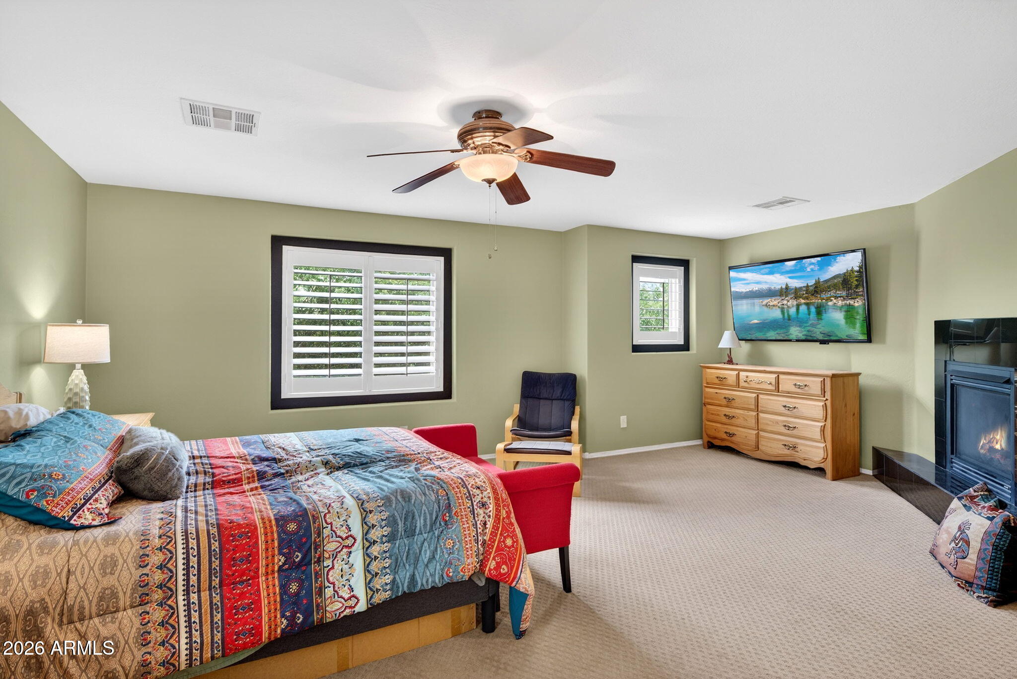 1729 South Reseda Street Gilbert, AZ 85295 - Photo 29 of 52 a bedroom with a bed and a tv