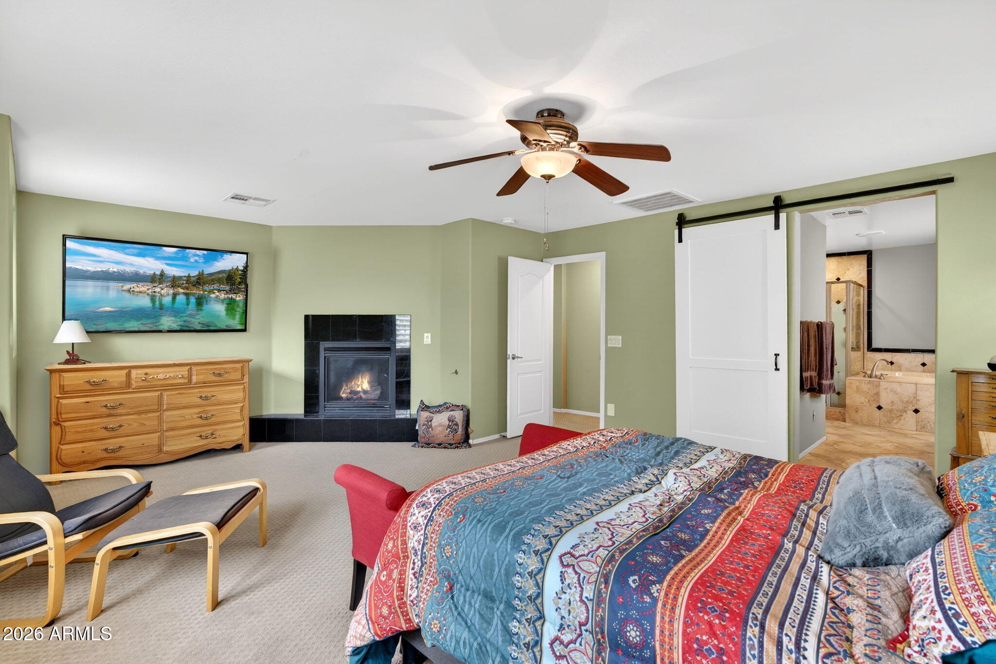 1729 South Reseda Street Gilbert, AZ 85295 - Photo 30 of 52 a bedroom with a bed and a chandelier